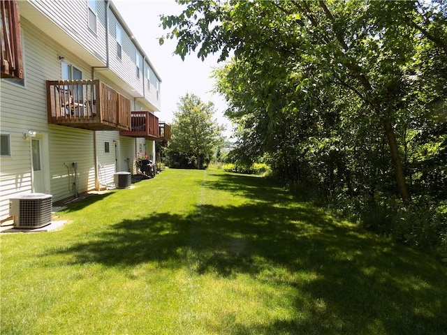 view of yard with central air condition unit