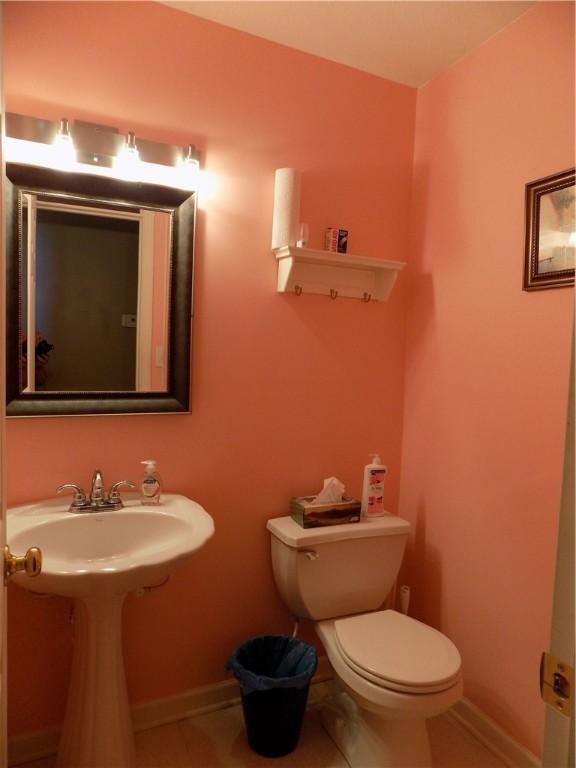 bathroom featuring toilet