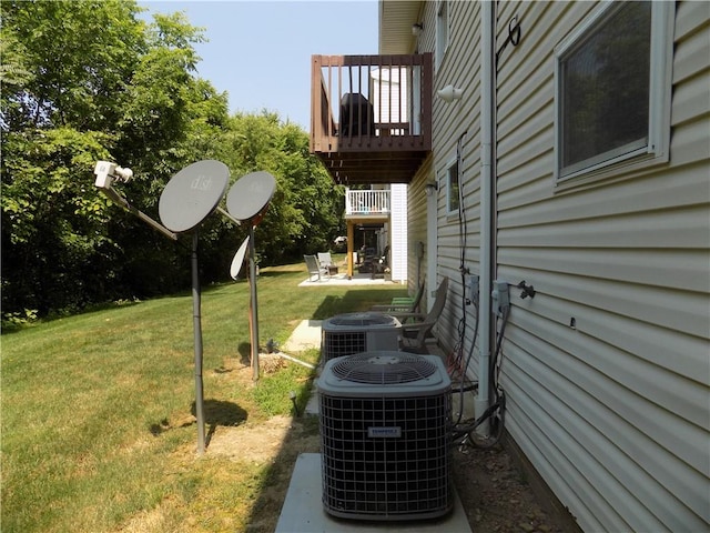 view of yard with central air condition unit