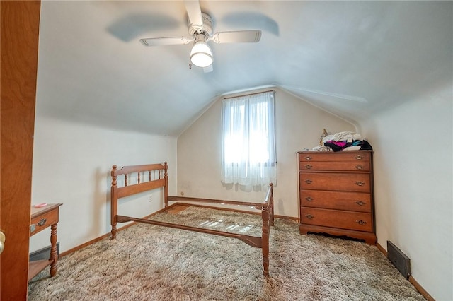 bonus room with ceiling fan, light colored carpet, and vaulted ceiling