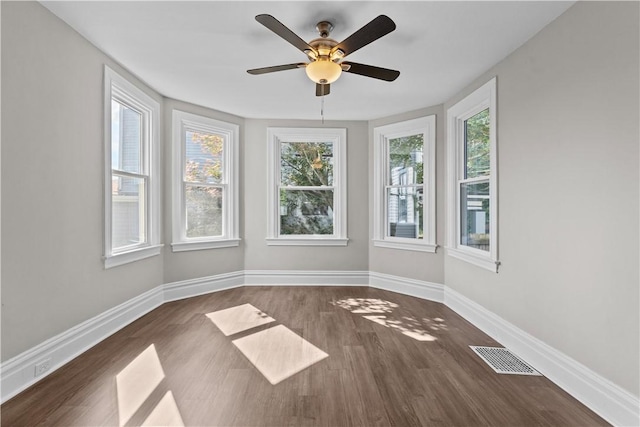 interior space featuring ceiling fan