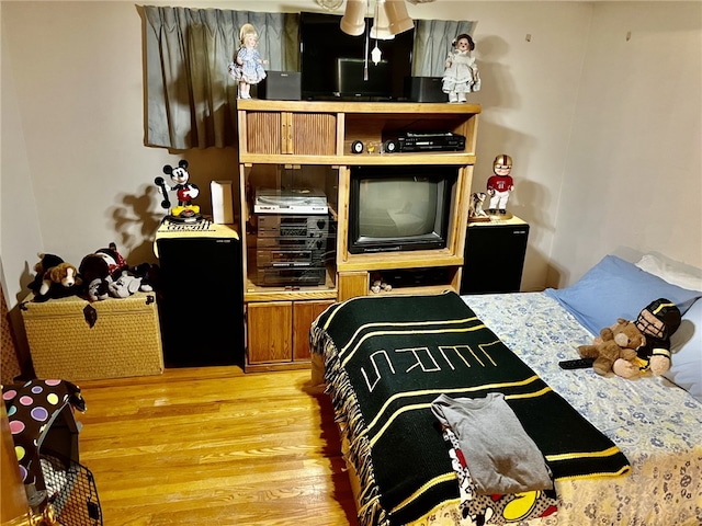 bedroom featuring wood-type flooring