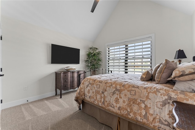 bedroom with carpet flooring, high vaulted ceiling, and ceiling fan