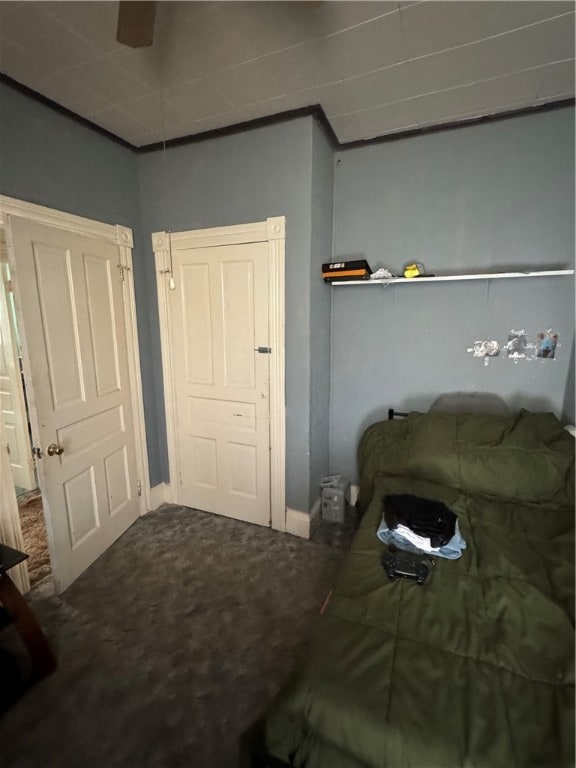 bedroom featuring carpet floors and ceiling fan