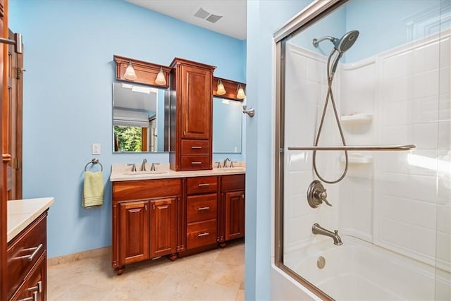 bathroom featuring vanity and washtub / shower combination