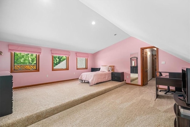 bedroom with carpet and vaulted ceiling