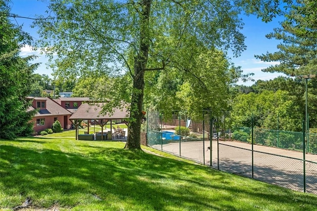 view of home's community featuring a yard