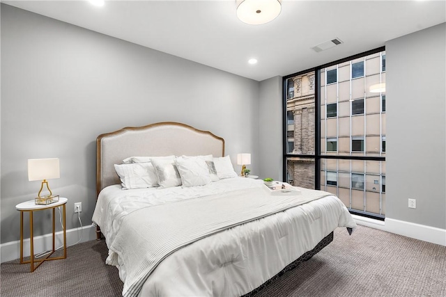 carpeted bedroom featuring visible vents, recessed lighting, and baseboards