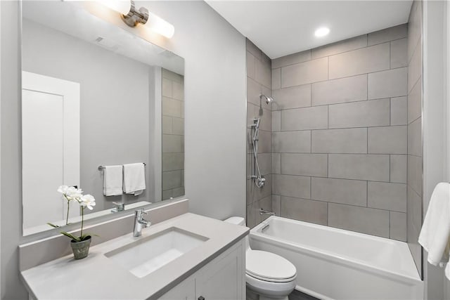 bathroom with washtub / shower combination, vanity, toilet, recessed lighting, and visible vents