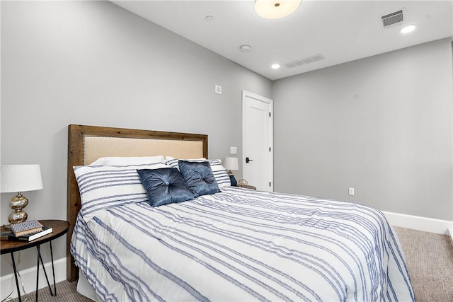 carpeted bedroom with visible vents, recessed lighting, and baseboards
