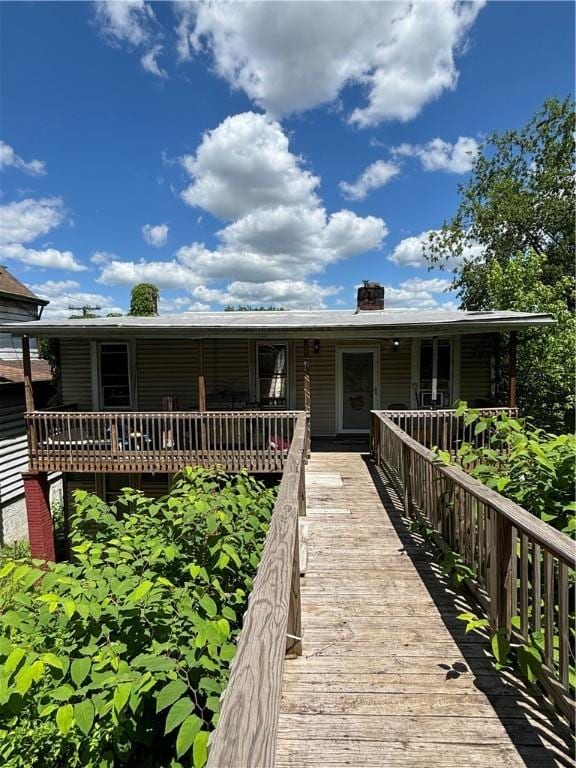 view of front of property featuring a chimney