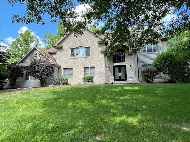 view of front of property with a front lawn