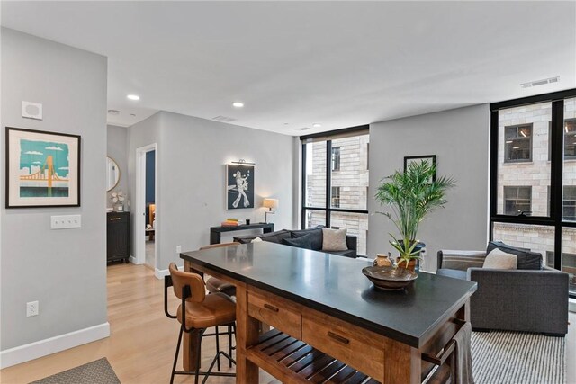 350 Oliver Ave Unit 908, Downtown Pgh, PA 15222 - dining space with recessed lighting, baseboards, visible vents, and light wood-style floors
