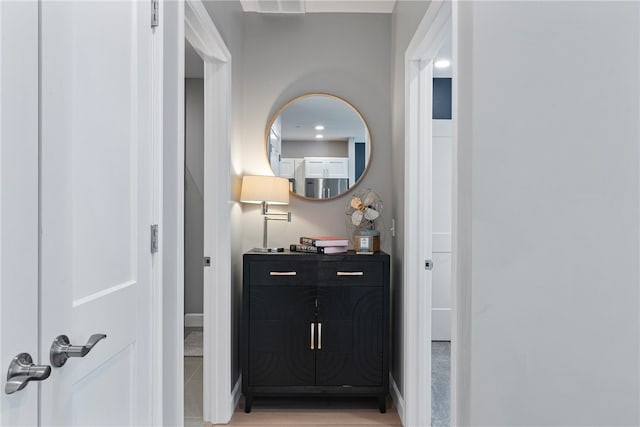 bathroom with wood-type flooring