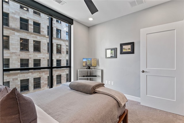 bedroom featuring ceiling fan and carpet floors