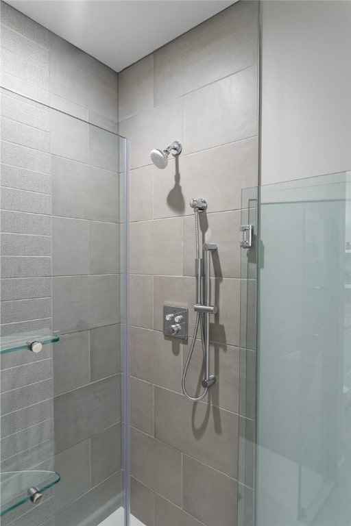 bathroom featuring an enclosed shower