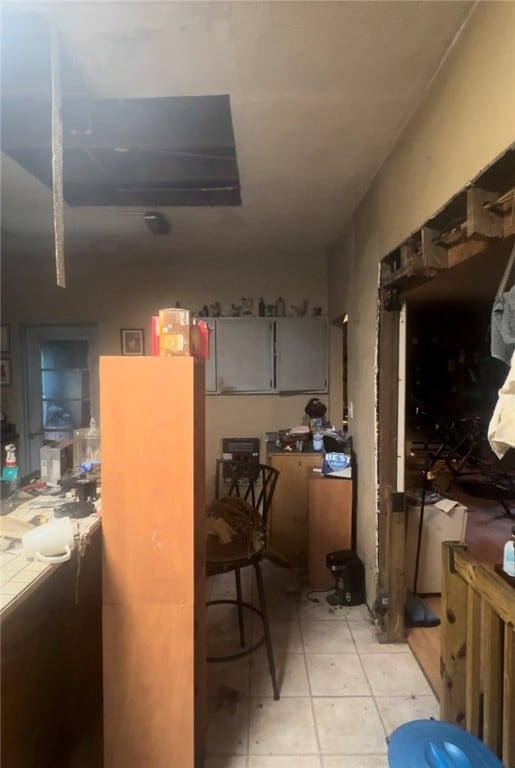 kitchen with light tile patterned floors