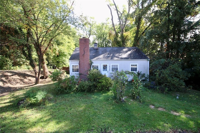 exterior space featuring a front lawn