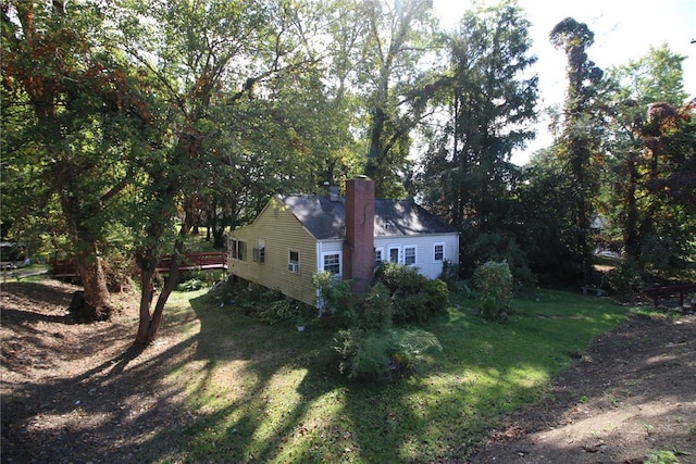 view of yard with a wooden deck