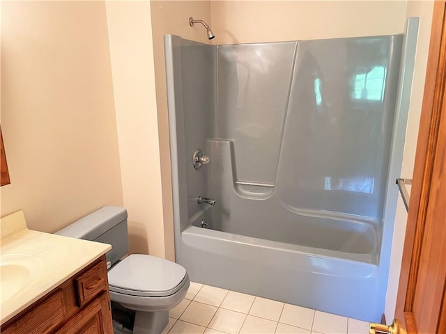 full bathroom featuring tile patterned flooring, vanity, toilet, and bathtub / shower combination