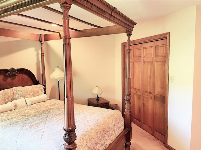 carpeted bedroom with a closet