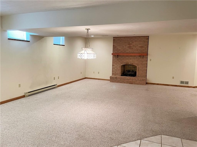 unfurnished living room featuring a fireplace, light colored carpet, and baseboard heating