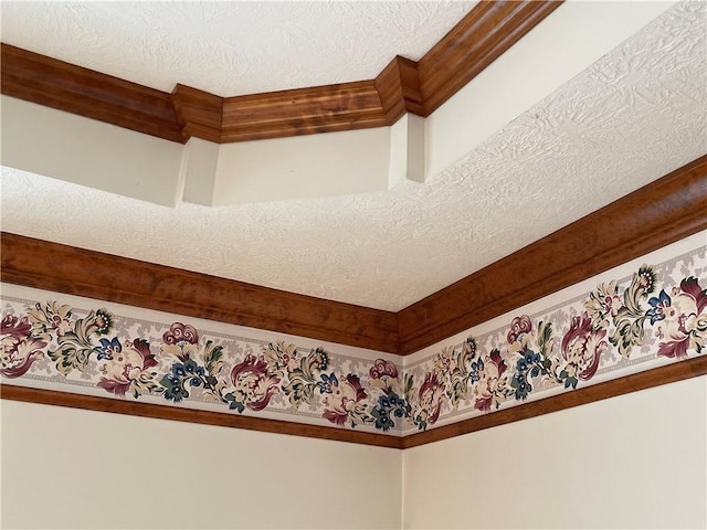 details with a textured ceiling