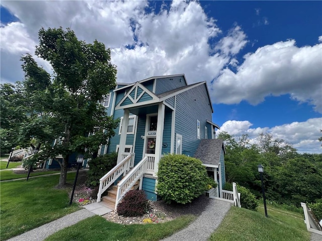 view of front of home with a front yard