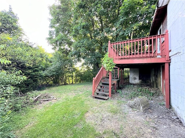 view of yard featuring a wooden deck