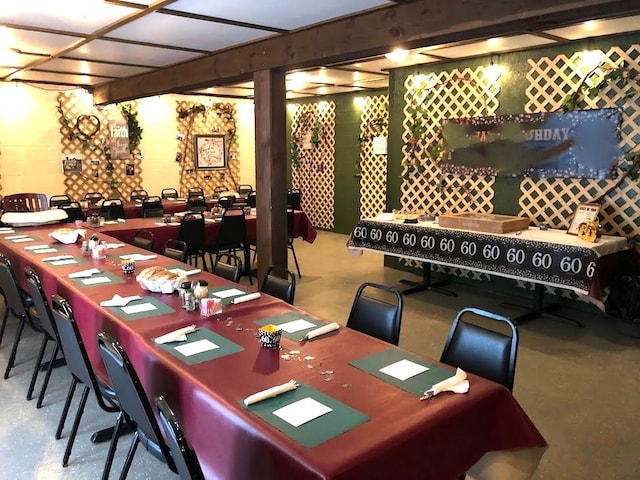 dining room featuring concrete flooring