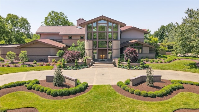 modern home with a front yard