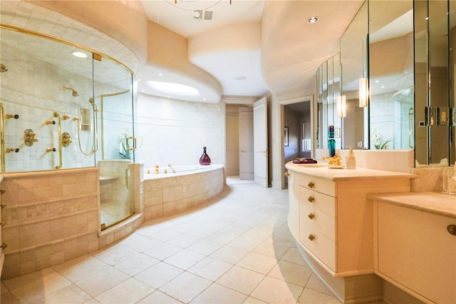 bathroom featuring vanity, tile patterned floors, and plus walk in shower