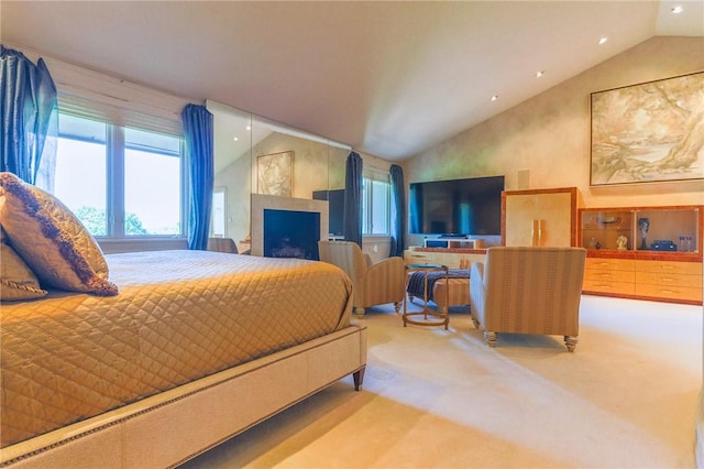 carpeted bedroom featuring lofted ceiling