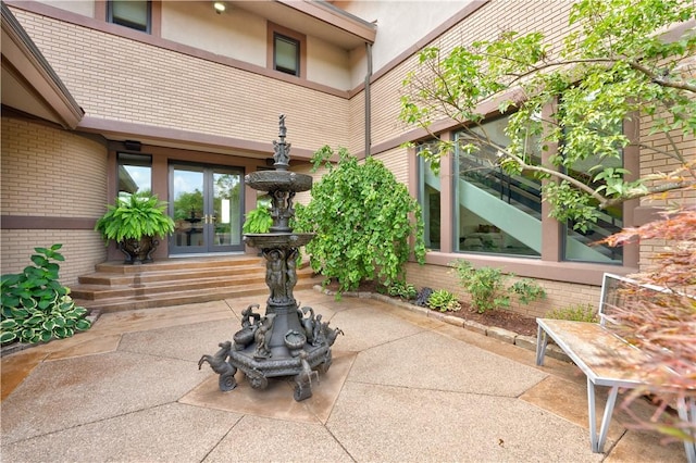 view of patio / terrace featuring french doors