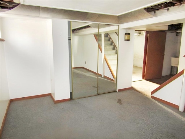 basement with carpet flooring