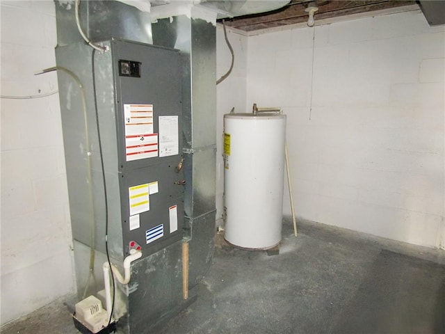 utility room with heating unit and water heater