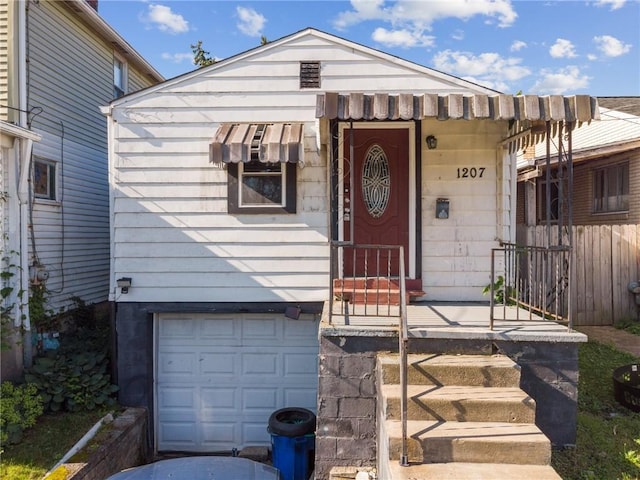 view of front of home with a garage