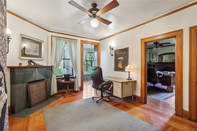 office area with ceiling fan, hardwood / wood-style flooring, and ornamental molding