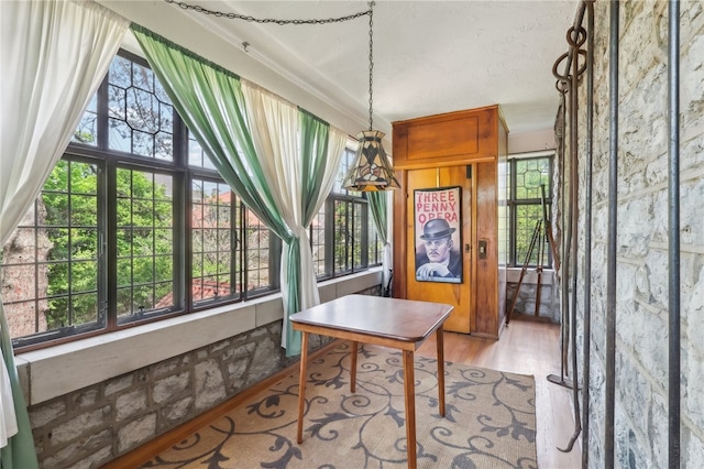 dining space featuring hardwood / wood-style flooring