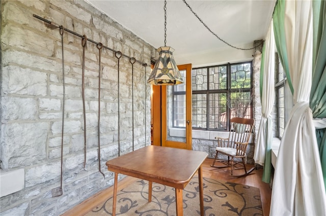 dining area featuring wood-type flooring