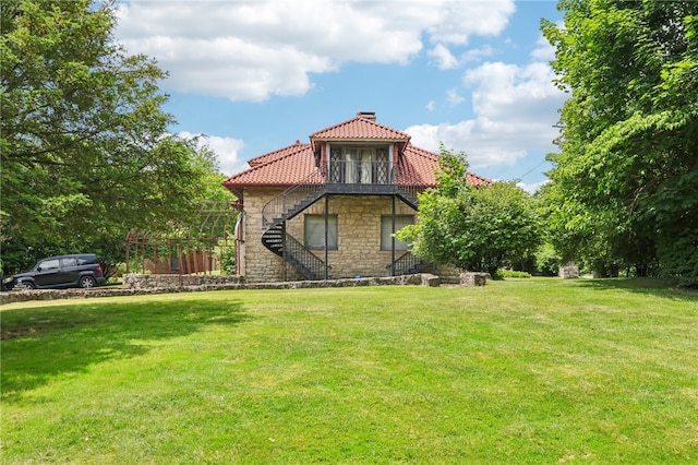 exterior space with a front lawn