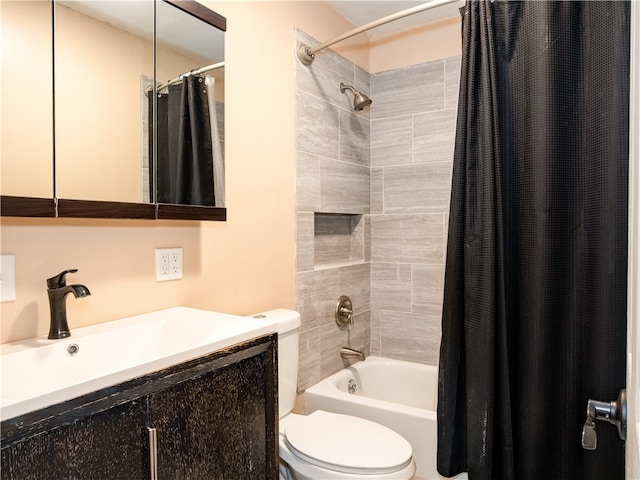 full bathroom featuring vanity, toilet, and shower / bathtub combination with curtain