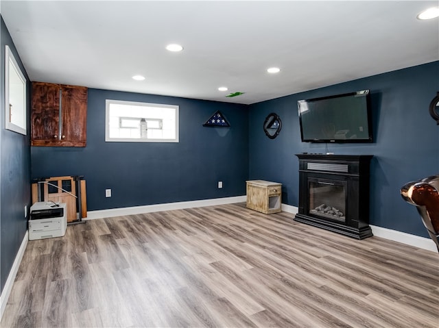 unfurnished living room featuring light hardwood / wood-style flooring