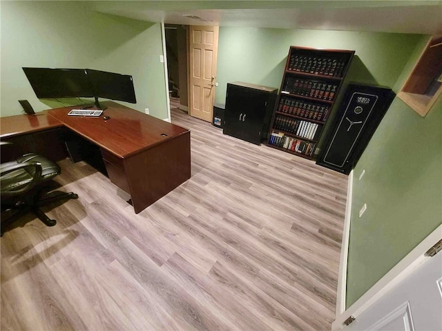 home office featuring light hardwood / wood-style flooring