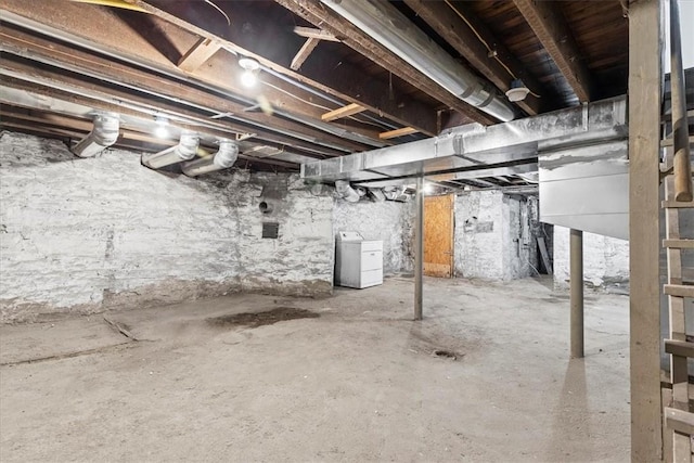 basement with washer / clothes dryer