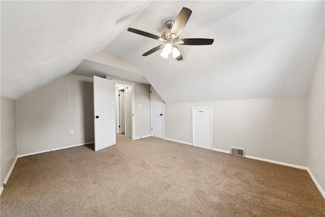 bonus room featuring ceiling fan, carpet floors, and lofted ceiling