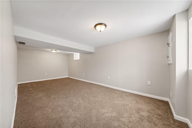 basement with dark carpet