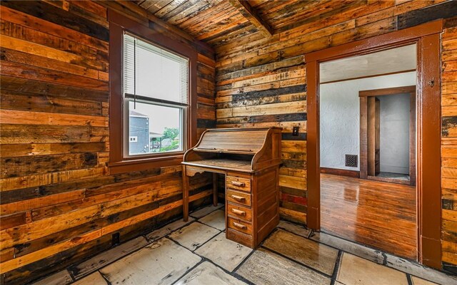 home office with wood ceiling and light hardwood / wood-style flooring