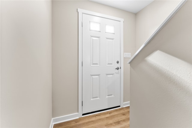 doorway with light hardwood / wood-style flooring