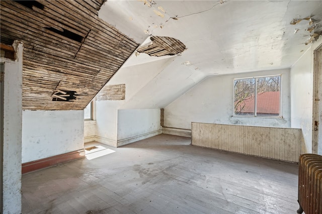 bonus room featuring lofted ceiling